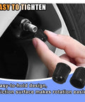 Hand installing 20Pcs Tire Valve Stem Caps With O-Ring Seal, Dust-Proof Air Valve Covers For Cars, Trucks in black.