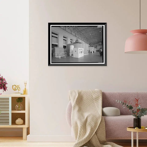 Vintage Framed Print Of Wilson Dam And Hydroelectric Plant Turbine And Generator Unit Spanning The Tennessee River On Wilson Dam Road In Muscle Shoals Alabama A Totally Dope Historical Wall Art For Home Decor From Library Of Congress Archive, hanging on a living room wall.