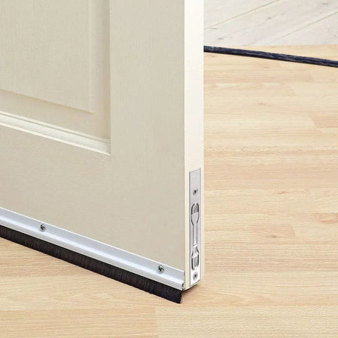 Two Pack Concealed Slide Door Lock And Eight Inch Flush Bolt Guard installed on bottom of wooden door, stainless steel construction