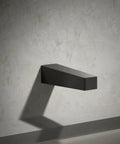 Matte Black Wall Mount Bath Spout For Honesty Collection With No Diverter Design One Half Inch NPT Or Slip Fit Connection on wall