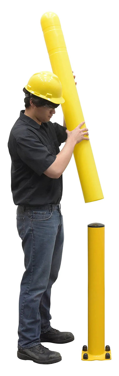 Hecka Sturdy Low Density Polyethylene Bollard Post Cover Slides On With Zero Sweat Shields Concrete Posts Indoors Or Out 52 By 5 Inches Bright Yellow Warehouse Floor Delineator being installed by a worker wearing a yellow hard hat.