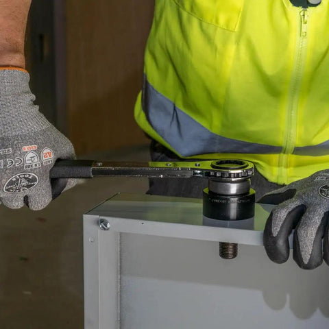 Using Optimized Knockout Punch Set For Ten Gauge Mild Steel With Three Quarters Inch Die Makes Wrenching A Breeze on metal panel