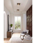 Briarwood Collection 2-Light Flush Mount Ceiling Light With Graphite Finish For Hallways Kitchens Bedrooms And Living Rooms 12 Inch By 6 Inch Modern Ceiling Fixture That Delivers A Warm Cozy Vibe stylishly illuminating a modern hallway.