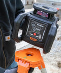 Green Self Leveling Rotary Laser Level Kit With Plumb Spot For Pro Grade Precision In Horizontal And Vertical Alignment, 1150 Foot Range With Detector, Rechargeable, Tripod, 9 Foot Grade Rod, Carrying Case, Class 3R rotary laser level in use on tripod