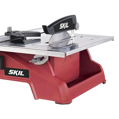 Heavy Hitter 7 Inch Wet Tile Saw With Rust Proof Stainless Top And Adjustable Rip Fence For Smooth Cuts On Ceramic Porcelain And Stone.