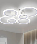 Six Ring Modern LED Ceiling Light Flush Mount With White Rings, 4000K daylight white lighting in a contemporary living room setting