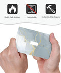 Totally Dope Grey And Gold Marble Single Toggle Switch Cover Plate With Bold Abstract Patterns Durable Plastic, held in hands.