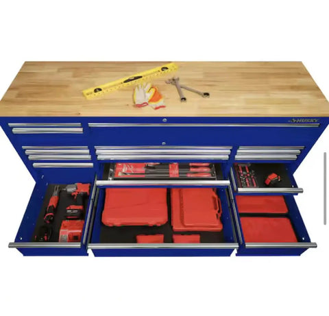 Badass 72 Inch Wide Mobile Workbench Tool Chest With Solid Wood Top Integrated Power Strip And 18 Hella Spacious Drawers For Rock Solid Gloss Blue Garage Storage, top view showing tools and organized drawers.