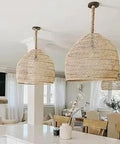 1 Light Rattan Chandelier With Large 19.68 Inch Wide Boho Woven Lampshade in modern kitchen with white decor