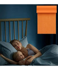 Get That Tight Soundproofing With These 5CM Thick Acoustic Foam Panels Rocking Flame Retardant Adhesive Backing For Quick Setup In Recording Studios And Home Lounges To Knock Down Echoes And Keep Your Vibes Clean, featuring a sleeping mother and child with an orange foam panel.