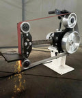 Badass 2X72 Inch Variable Speed Belt Sander And Multi Angle Vertical Horizontal Grinder For Knife Polishing With Three Abrasive Wheels And Rock Solid Base 110V 2840 RPM Shop Staple, showing sparks from metal sharpening.