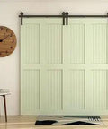 Bi Folding Sliding Barn Door Hardware Kit 72 Inch For Four Doors Black J Shape Rollers installed on light wooden doors