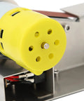 Close-up of the yellow motor on the Pro 200W Mini Belt Sander Electric Polishing Grinder, showcasing its design and assembly.