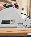 Badass Scorer Plunge Saw Delivering Smooth Tear Free Cuts On Veneer And Laminated Sheets With Diamond Scoring Blade Comes Fully Rigged And Tight For Serious Shop Work on workbench.