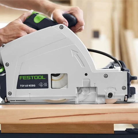 Badass Scorer Plunge Saw Delivering Smooth Tear Free Cuts On Veneer And Laminated Sheets With Diamond Scoring Blade Comes Fully Rigged And Tight For Serious Shop Work on workbench.