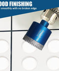 Close-up of blue tile hole-saw bit with diamond edge, mounted in a drill chuck for ceramic/porcelain tile drilling