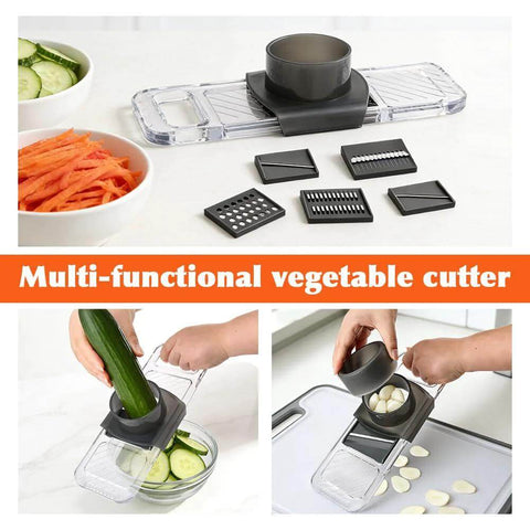 Front-view kitchen mandoline slicer with 6 blades and safety hand guard; stainless steel blades, clear plastic base