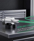 Road Ready 12V Diesel Heater Fuel Pump Featuring Slick Quiet Functioning And Rugged Abs Build resting on a surface with a green hose attached.