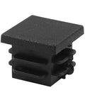 Close-up of 12 Pack 3/4 Inch Square Plastic Plugs End Caps For Square Tubes And Furniture Legs Black Ribbed Design Durable Floor Protectors