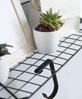 Four Pack Overhead Garage Storage Hooks Black Heavy Duty Ceiling And Wall Hanging Hooks installed on wire shelf with decor