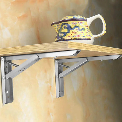 Heavy Duty Folding Triangle Wall Brackets For Custom Corner Shelves, built like a tank holding a shelf with a teapot.