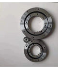 Heavy Duty External Gear Rotary Bearing For Hanging Turntables built tough, showcasing two sizes, polished steel finish, low friction design.