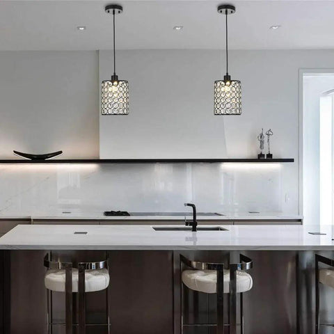 2 Pack Chrome Crystal Pendant Lights With Long Adjustable Cords in modern kitchen, featuring silver fixtures and dimmable design