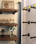 Industrial Iron Pipe Shelf Brackets 8 Inch Floating Shelves Tough As Nails Heavy Duty Metal Brackets For Wood Shelves Supports Up To 120 Lbs Black 6 Pack Easy DIY Industrial Look For Living Room Kitchen, mounted with decor and installation view.