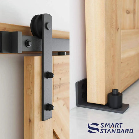 Close-up of Heavy Duty Sliding Barn Door Hardware Kit In Black, Includes Pull Handle Set And Floor Guide, Fits 34 To 36 Inch Door Panels.