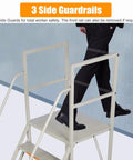 Heavy Duty Rolling Warehouse Ladder with Platform Rock Solid Industrial Step Stair Built Like a Tank Slick Locking Caster Wheels Detachable Safety Rails showing a worker using its 3 side guardrails.