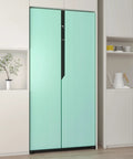 Thick Pastel Mint Metallic Peel And Stick Wallpaper With Brushed Matte Surface on a fridge in a modern kitchen.