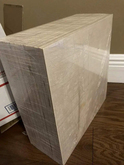 Top Tier Baltic Birch Plywood Sheets, 1/8 Inch Thick, Smooth BB Grade Face, CNC Router And Engraving Ready, stacked in bulk.