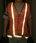 High Visibility Reflective Safety Vests 10 Pack, Adjustable Lightweight Neon Orange with 360 Degree Reflective Strips, worn by adult