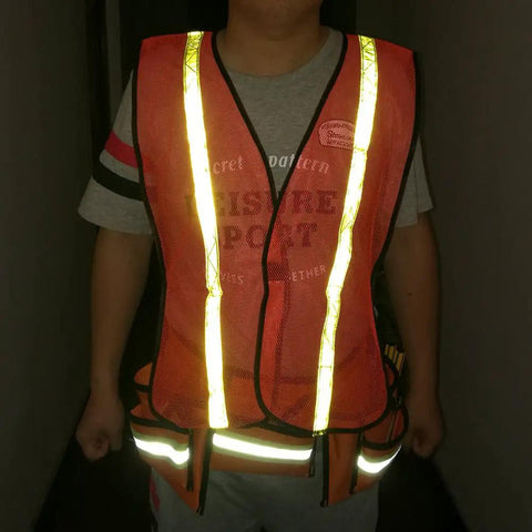 High Visibility Reflective Safety Vests 10 Pack, Adjustable Lightweight Neon Orange with 360 Degree Reflective Strips, worn by adult