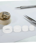 No Sweat Two Sets Grinding Wheel Diameter Sleeves Plastic Bushing Adapter Kit For Bench Grinder on a workspace with tools.
