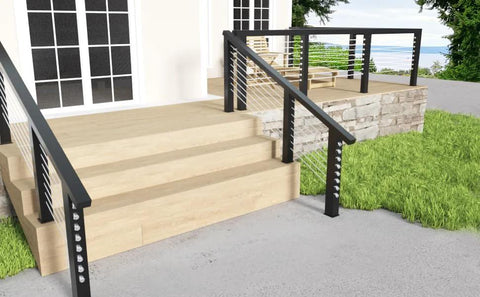 Outdoor deck with stairs featuring black posts and stainless steel cable railing, showcasing installation of railing hardware.