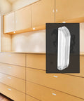 Close-up of Ten Pcs Mini Acrylic Pull Handles 2 Inch Clear Hardware for Jewelry Boxes and Craft Projects against wood cabinet