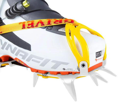 Ski Tour New-Matic Crampons For Ski Touring With Ultra Lightweight, Bomb Proof Front Bail on white boot, close-up view