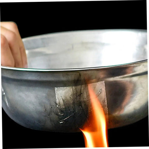 Leak Proof Aluminum Repair Patches For Pots And Pans 10 Sheet Kit Easy To Use Adhesive No Tools Required Cookware Repair Tape visible on pot with flame