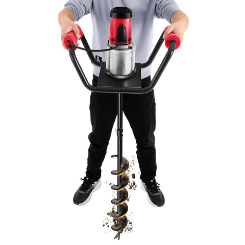 Person using Beast 110V 1500W Electric Post Hole Digger Auger Drill with 4 Inch Bits for ground drilling