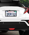 Lock Your Plates Down Tight With These Sleek Black License Plate Screws Featuring Tamper Proof Anti Theft Design Made From Sturdy One Quarter Inch Stainless Steel For Quick Install And Heavy Shield Against Highway Hooligans And Dust visible on a white car with California license plate.