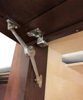 Soft Close Kitchen Support Hinge For Cabinets And Wardrobes With Drop Lids installed on wooden cupboard door for smooth closing