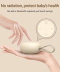 On The Go Baby Sleep Sound Machine With 12 Soothing White Noise Tracks USB Recharge 15 Hour Battery Life handheld view