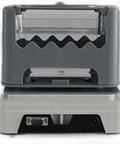 Knockout Precision Digital Density Meter That Slacks On Setup But Delivers Heavy Duty Gravimeter Results For Rubber Solid Granules And Thin Films With Zero Sweat Auto Calibration showing front view with transparent chamber.