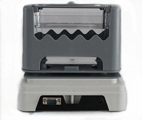 Knockout Precision Digital Density Meter That Slacks On Setup But Delivers Heavy Duty Gravimeter Results For Rubber Solid Granules And Thin Films With Zero Sweat Auto Calibration showing front view with transparent chamber.