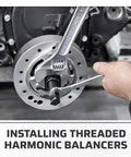 Harmonic Balancer And Pulley Installer Tool Kit 33 Piece Set being used for crankshaft removal and install with wrench