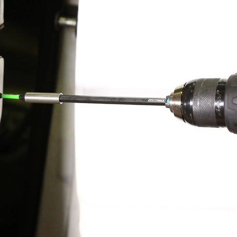 Close-up of a drill using the Beefy Five Piece Impact Driver Bit Set With Hex Socket Adapters And Six Inch Drill Extension