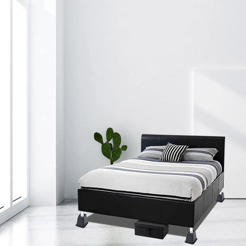 Heavy Duty Bed Riser Set 3 Inch Elevates Beds Couches Desks Sofas And Bunk Posts 4 Pack For Extra Storage And Space Saving In Small Rooms Dorms And Apartments shown under a bed in a modern bedroom.