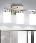 Brushed Nickel Vanity Light For Bathroom Mirrors Hits Different For Your Vanity Area Solid Pick With Etl Certified Ceramic E26 Socket overhead with three white glass shades.