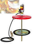 Heavy Duty Pneumatic Grease Pump For 55 Gallon Drums with red base, air hose, and grease dispensing nozzle in focus.
